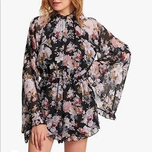 NWOT. Floral Printed Ruffle Bell Sleeve Romper